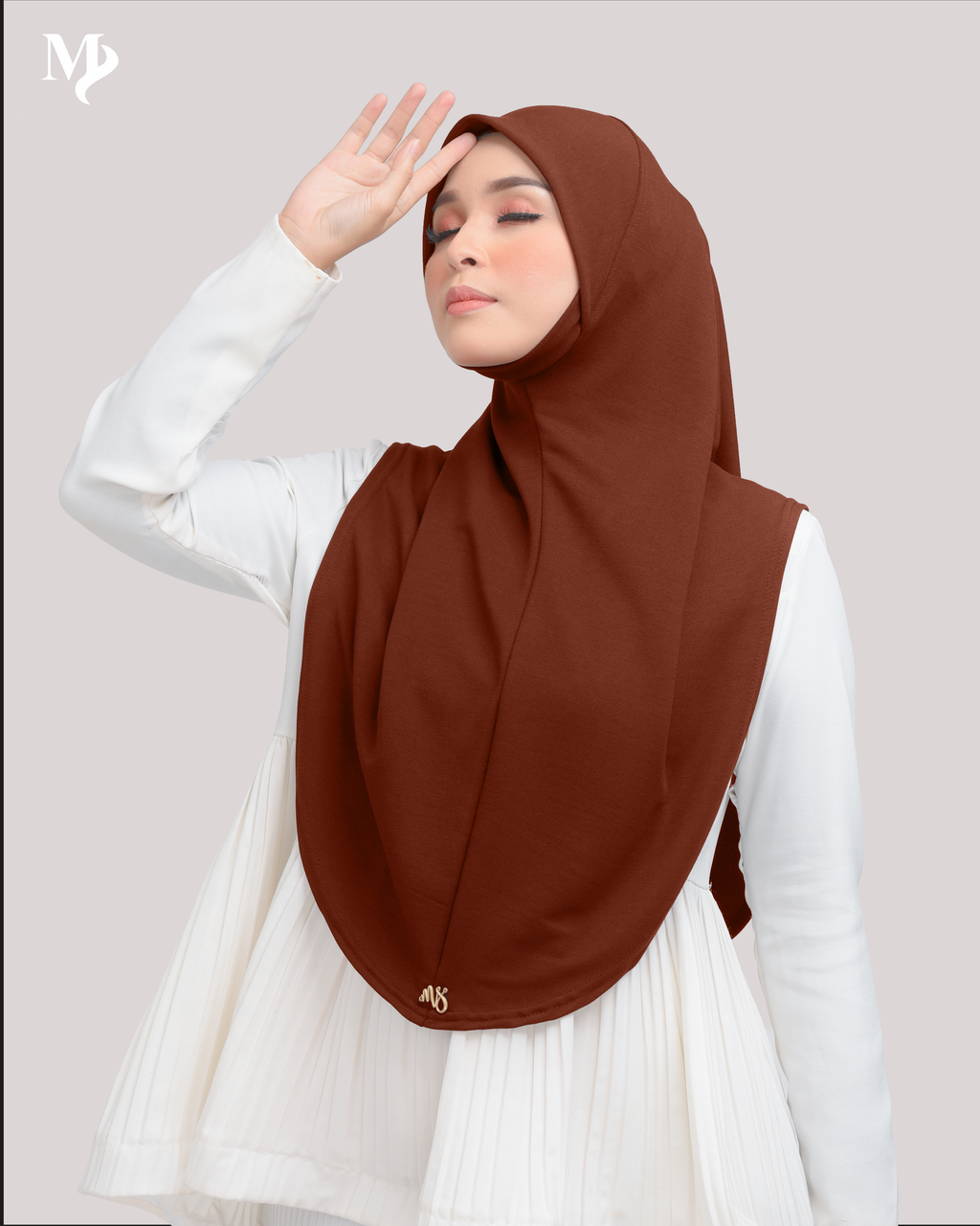MARYAM SARUNG IN BURNT ORANGE