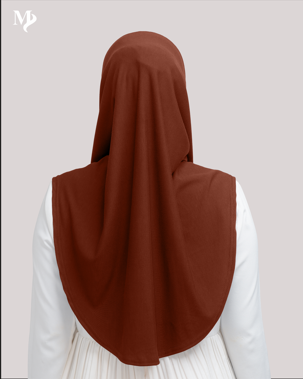 MARYAM SARUNG IN BURNT ORANGE