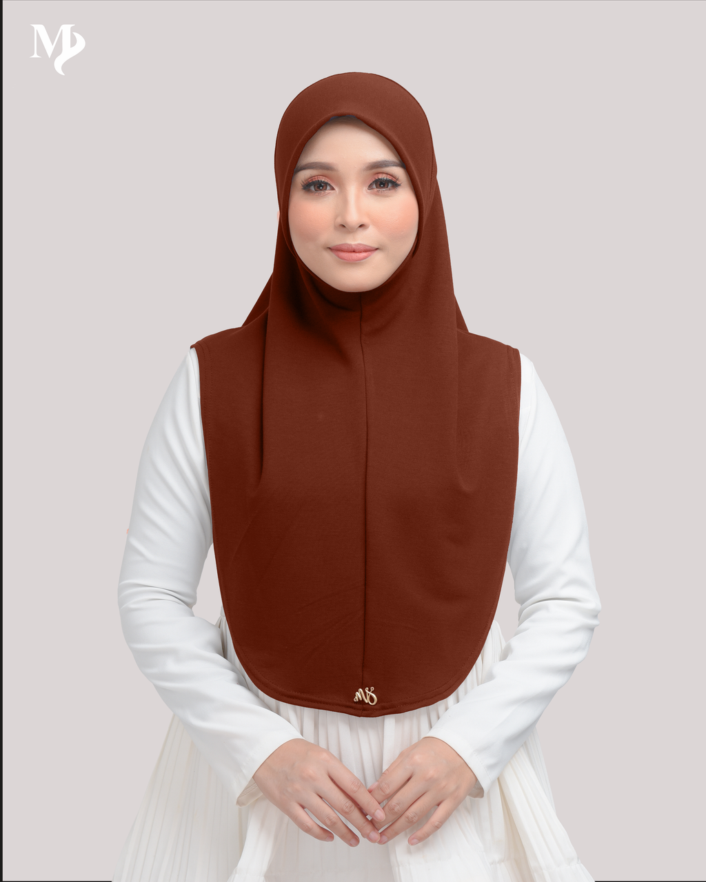 MARYAM SARUNG IN BURNT ORANGE