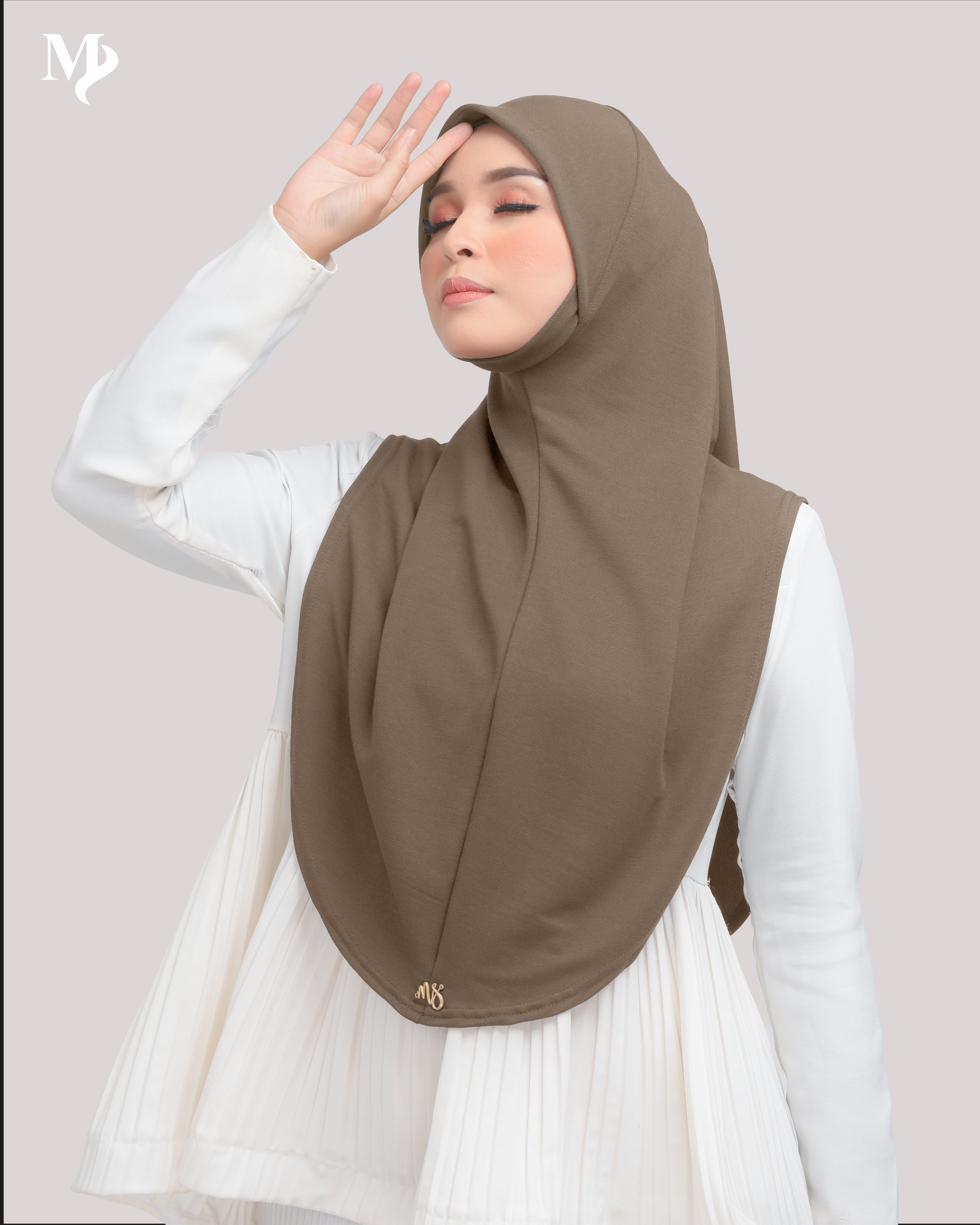 MARYAM SARUNG IN GINGERBREAD