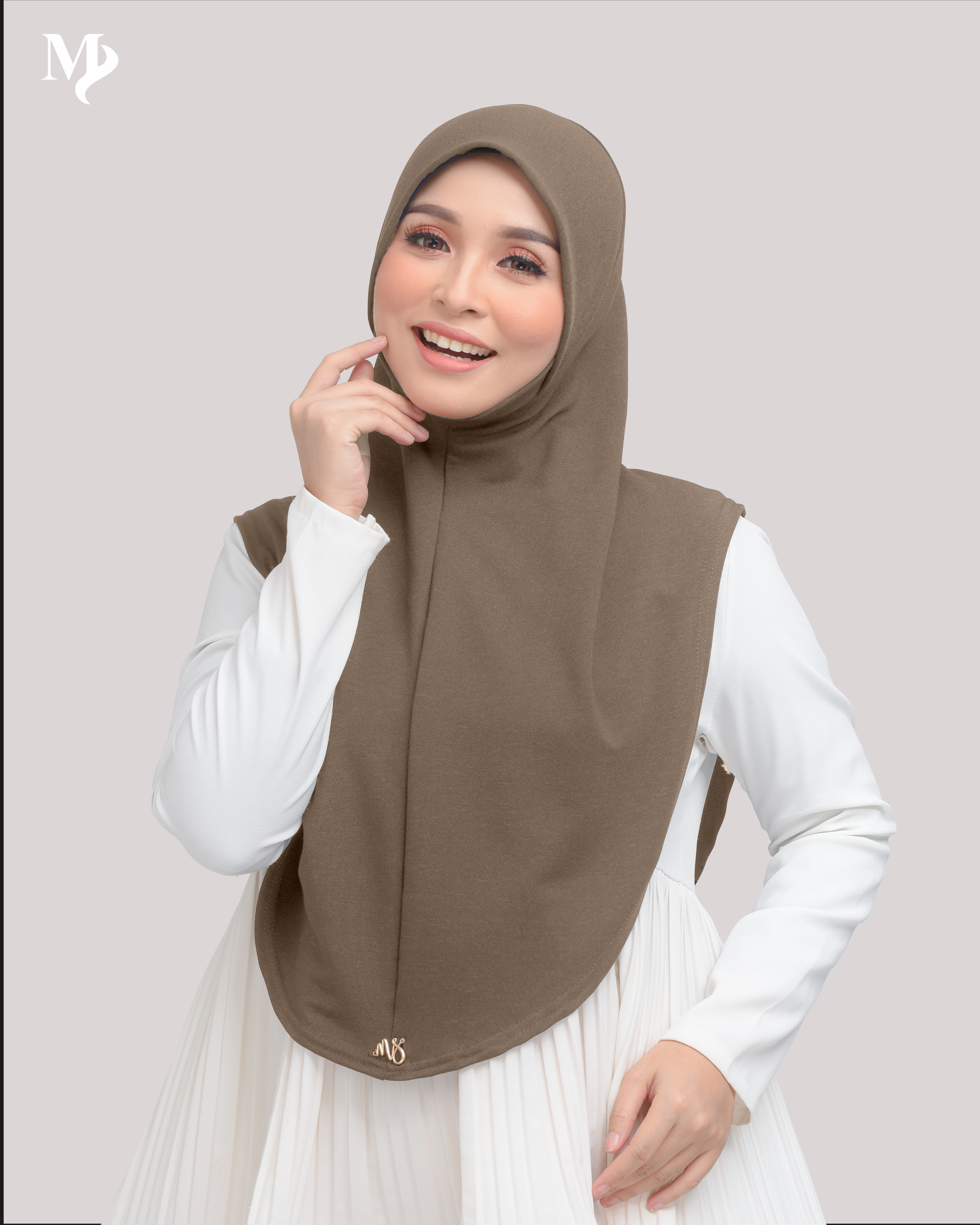 MARYAM SARUNG IN GINGERBREAD