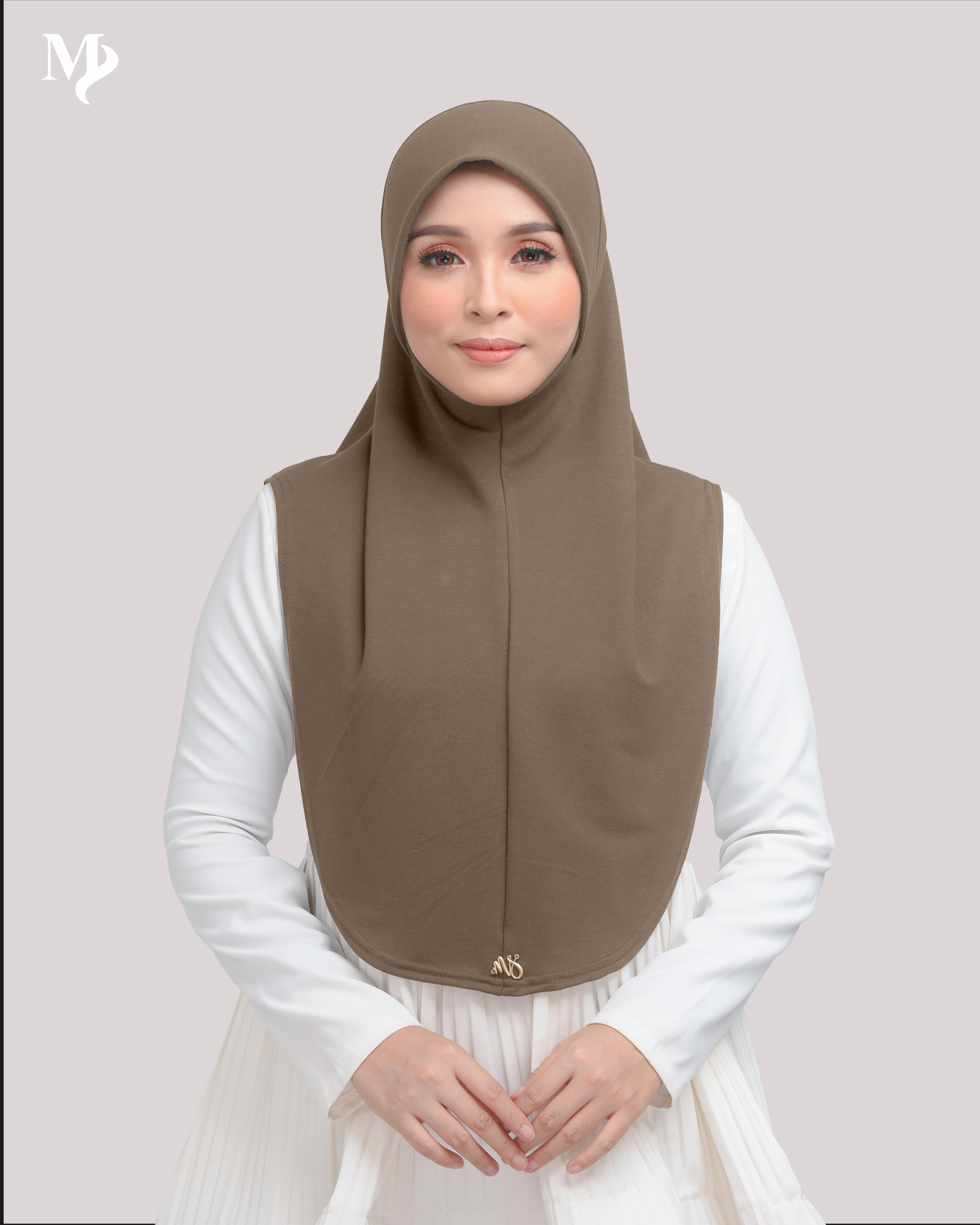MARYAM SARUNG IN GINGERBREAD